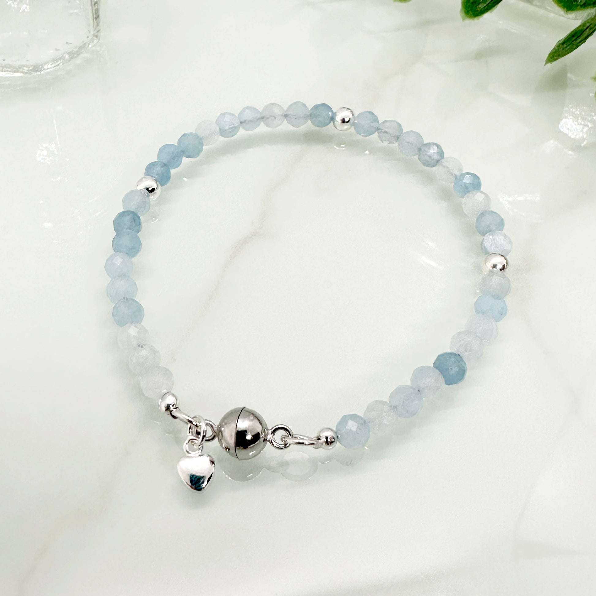 Aquamarine sterling silver bracelet with heart charm and magnetic clasp, March birthstone jewellery UK