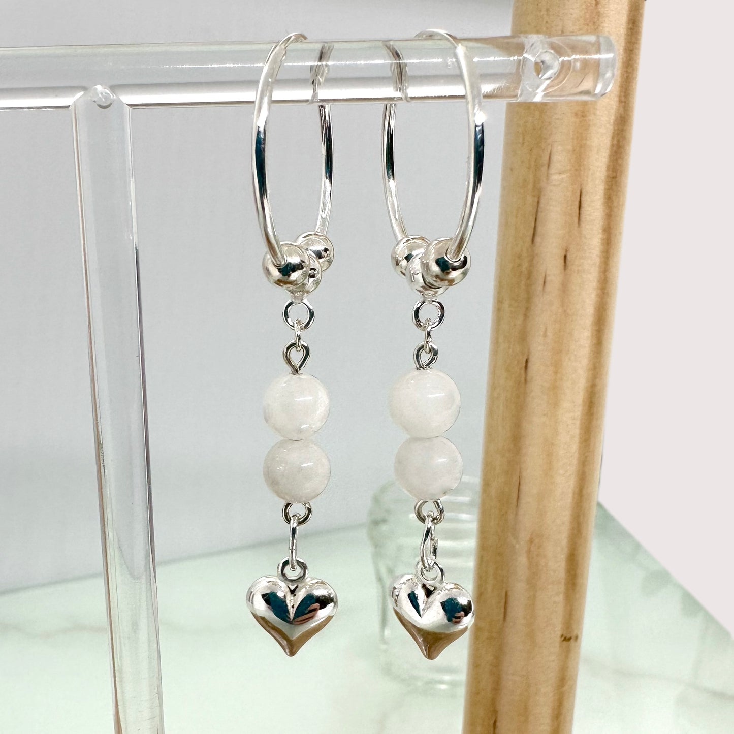 Sterling silver sleeper hoop earrings with moonstone beads and silver heart charm, handmade UK jewellery