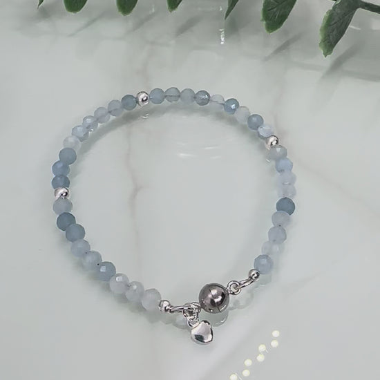 Dainty faceted aquamarine sterling silver bracelet with heart charm and magnetic clasp, March birthstone jewellery UK